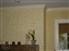 antiqued brick fireplace and strie wall